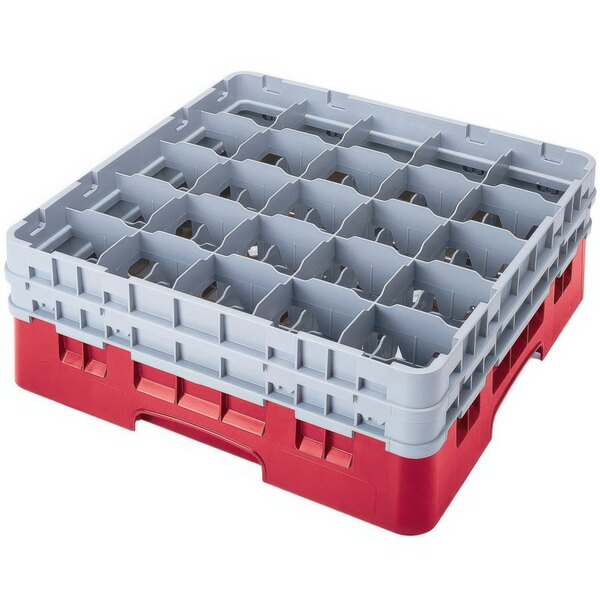 A red and grey plastic Cambro glass rack with many compartments.