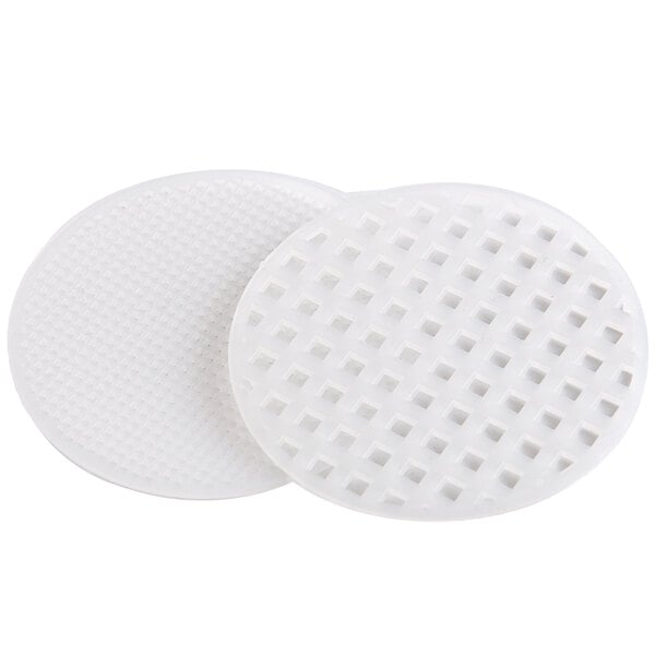 Two white round pads with holes in them used for the Bar Maid Drain Funnel.