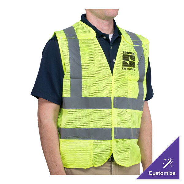 A person wearing a lime green Cordova high visibility safety vest.