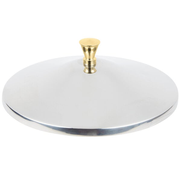 A stainless steel Vollrath lid with a brass handle.