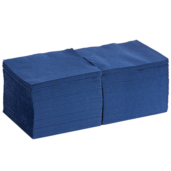 A stack of navy blue paper napkins.