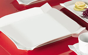 A CAC Times Square bright white square china plate.