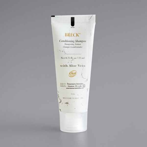 A white plastic Dial conditioning shampoo tube with black text.