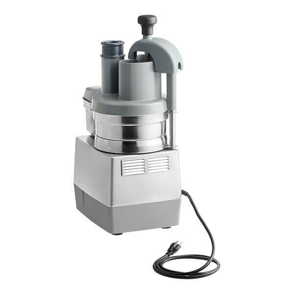 A commercial Robot Coupe CL40 continuous feed food processor with a 1 hp motor and two discs.