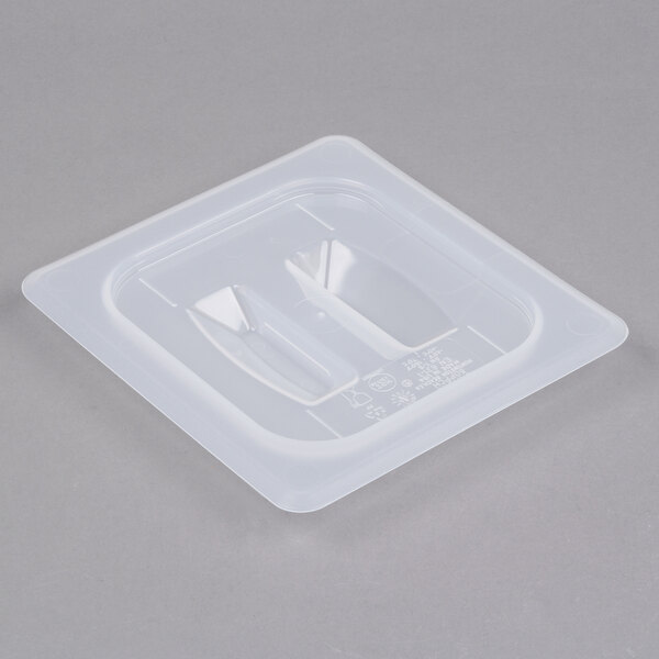 A translucent plastic lid with handles for a Cambro food container.