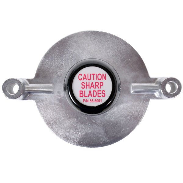 A circular metal Vollrath 316 pusher head with a red and white caution label.
