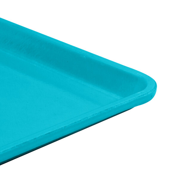 A close up of a blue Cambro dietary tray.