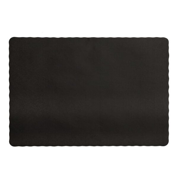 A black paper placemat with scalloped edges.