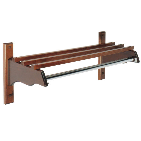 A mahogany hardwood wall mount coat rack with metal hanging rod.