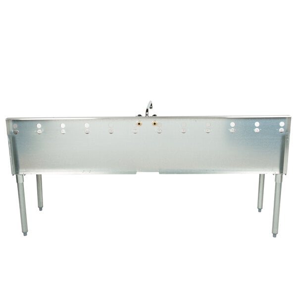 The back of an Eagle Group stainless steel bar sink with two drainboards.