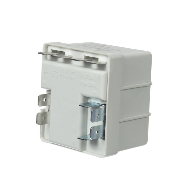 a white electrical device with metal parts