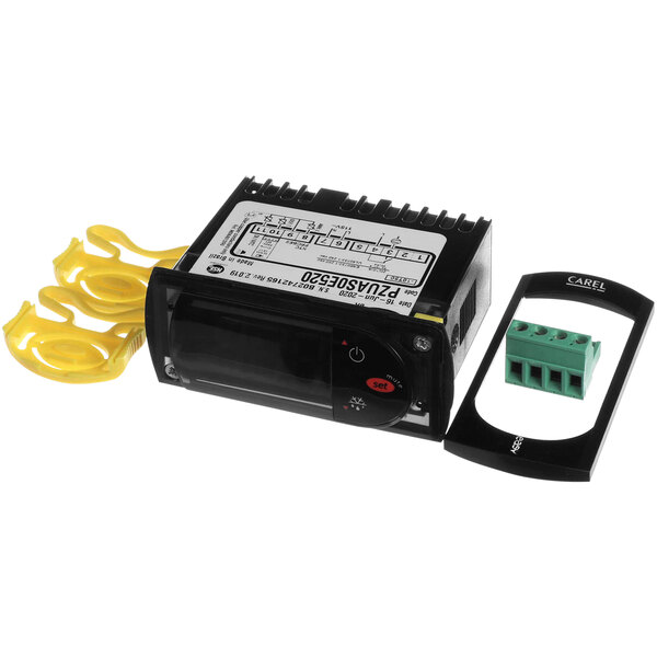 A black electronic device with yellow wires.