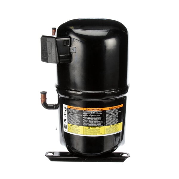 A black Master-Bilt air compressor with a yellow label.