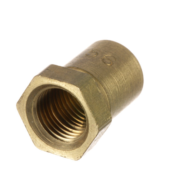 A close-up of a brass threaded nut.