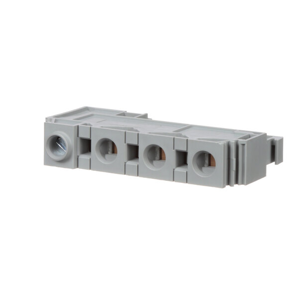 A grey Meiko terminal block with three holes.