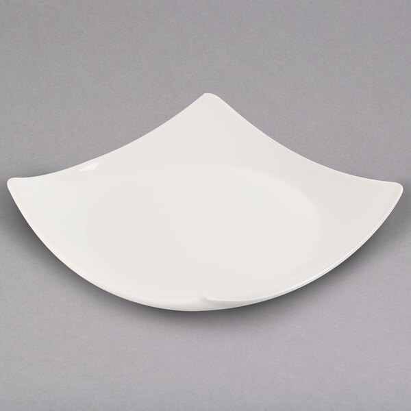 a white plate with a curved edge