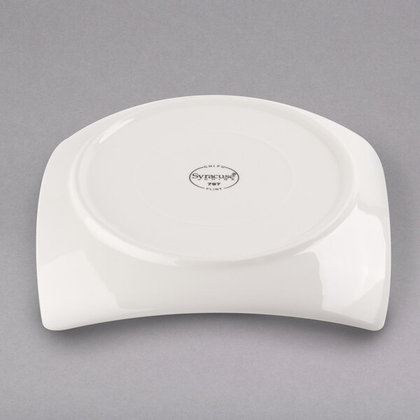 A Libbey ivory porcelain coupe plate with a circular design in ivory.