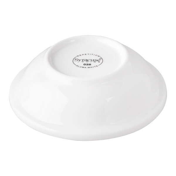 A white porcelain fruit bowl with a logo reading "Reserve by Libbey" on it.