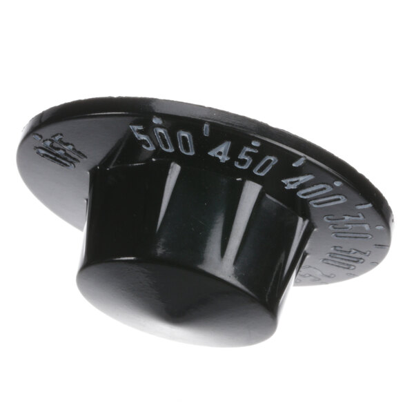 A close-up of a black plastic Southbend range dial with numbers.