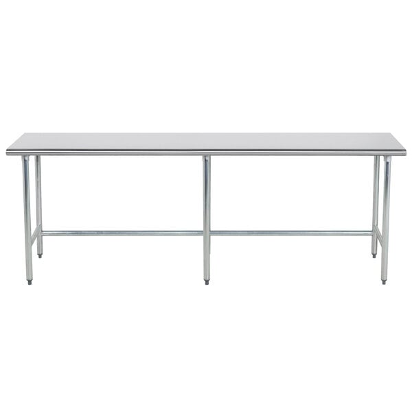 An Advance Tabco stainless steel work table with an open base.