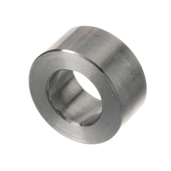 A close-up of a circular metal Baxter bearing spacer.