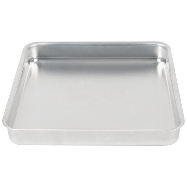 An American Metalcraft heavy weight aluminum square baking pan with a metal surface.