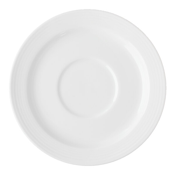 A white plate with a round rim.