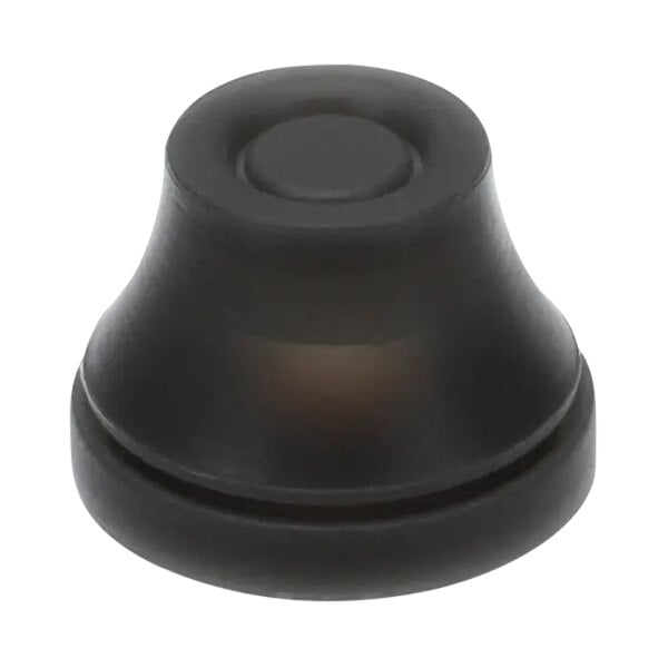 A black plastic object with a circle in the center.