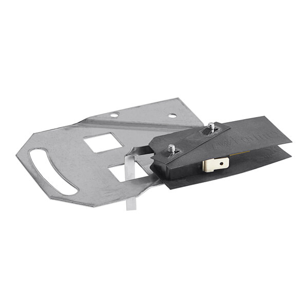 A metal bracket with a black rectangular switch on it.