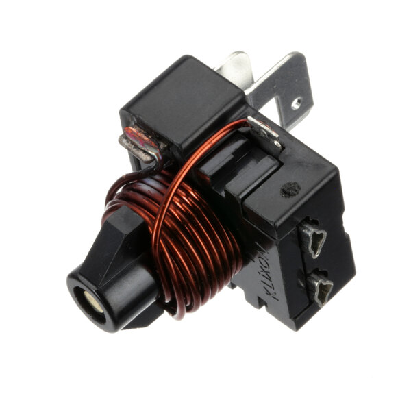 A close-up of a small black Duke Start Capacitor.