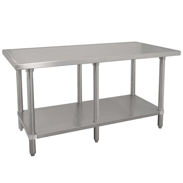 An Advance Tabco stainless steel work table with a stainless steel undershelf.