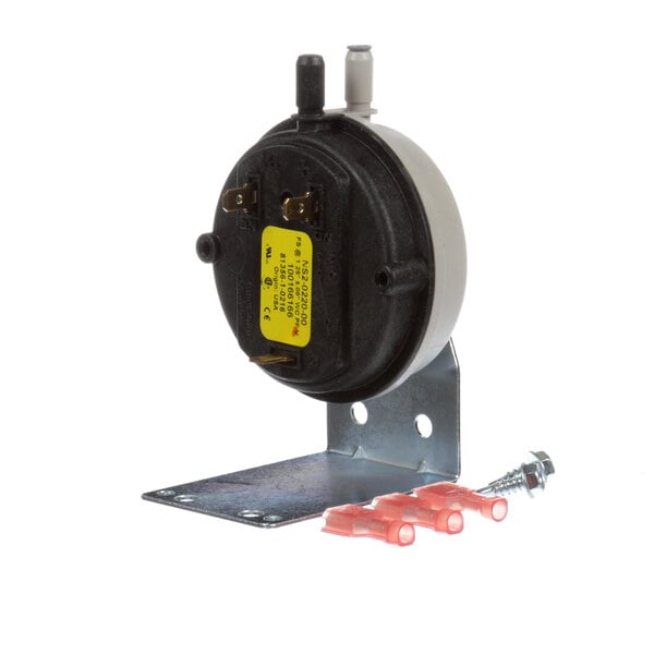 A round black and white Lochinvar air pressure switch with a yellow label.