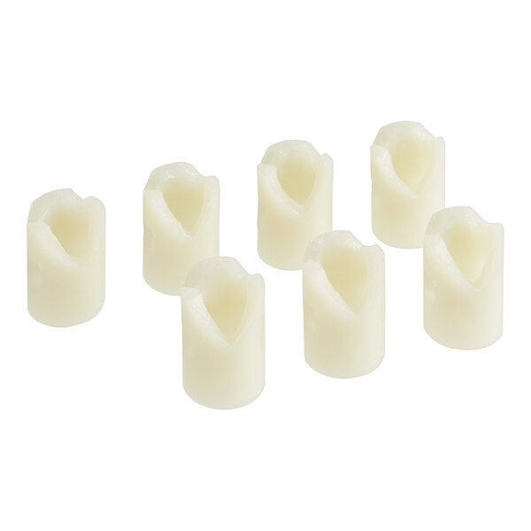 A group of white plastic Cres Cor Cam Kit parts.