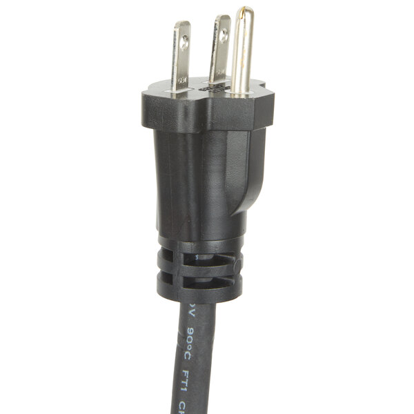 A black power cord with two plugs on it plugged into a black plastic object with a black handle.