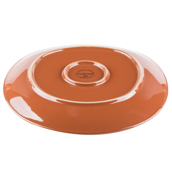 A brown plate with a round rim.