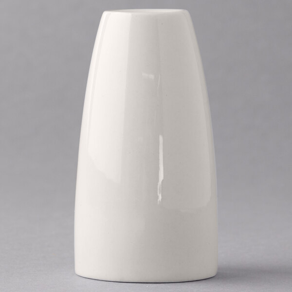 A white cylindrical Libbey porcelain salt shaker.