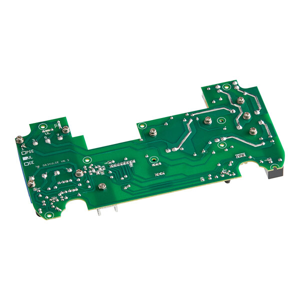A green Hamilton Beach circuit board with many electronic components and small holes.