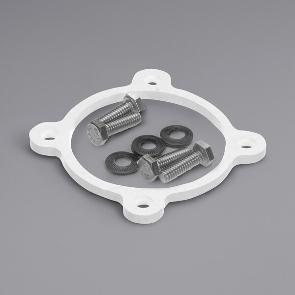 A white plastic circle with bolts and nuts.