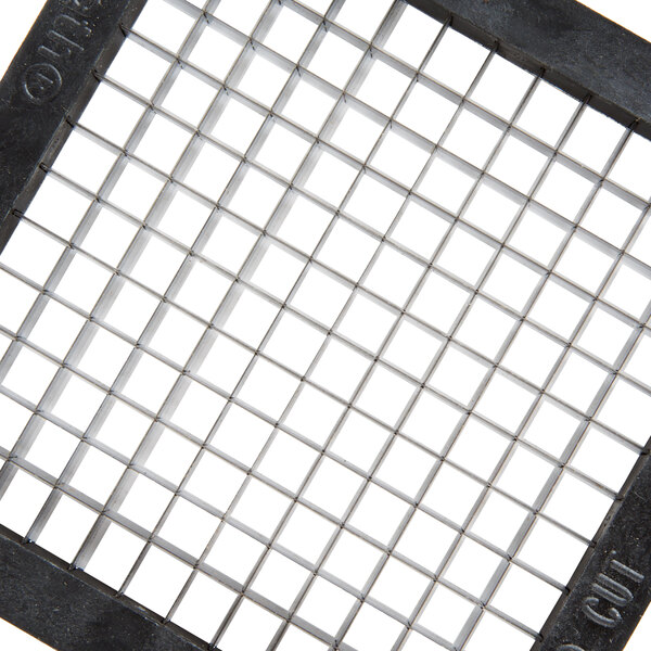 A metal square with black squares and white squares.