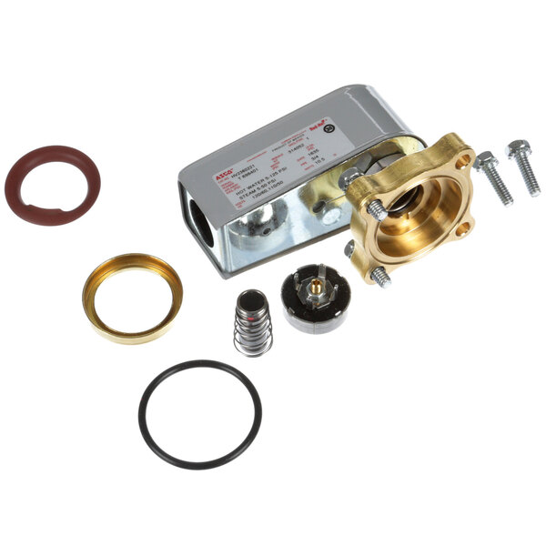 A Stero piston replacement kit with metal and brass parts, including a metal ring and screws.