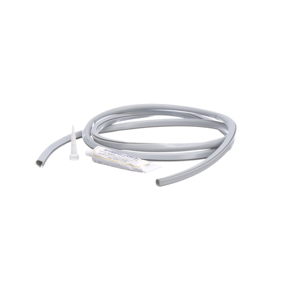 A white tube with a white tip and a white package of NU-VU 254-1011 Door Gasket.