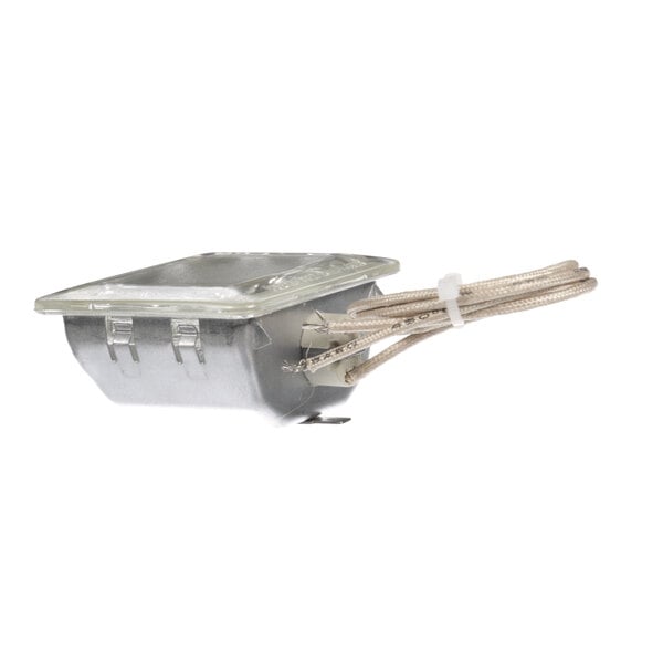 A close-up of a metal box with wires attached to it containing a Blodgett 55607 bulb.