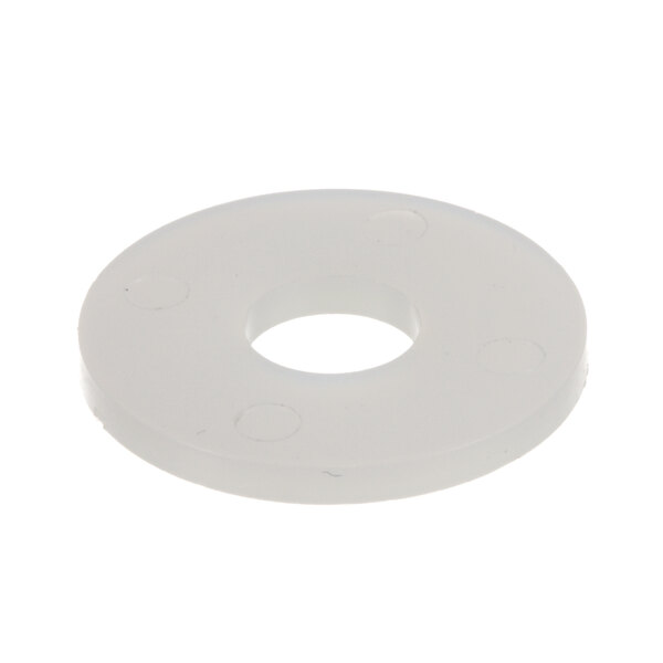 A white round washer with a hole in the middle.