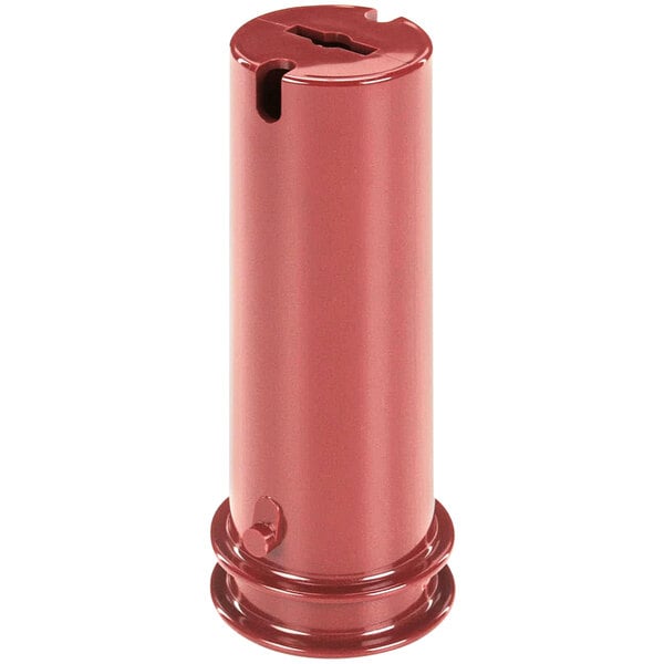 A red plastic cylinder with a hole in the middle.