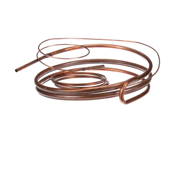 A close-up of a copper tube with a long coil of copper wire inside.