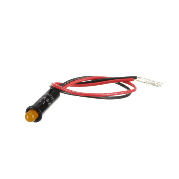 A close-up of a yellow Baxter light with a red and black cable.