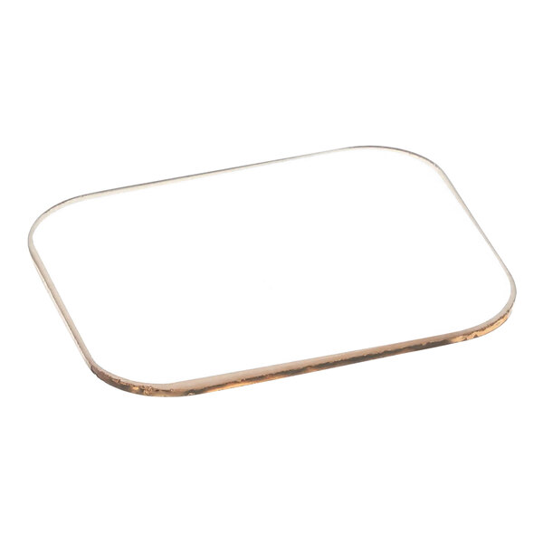 A white rectangular object with a gold border.