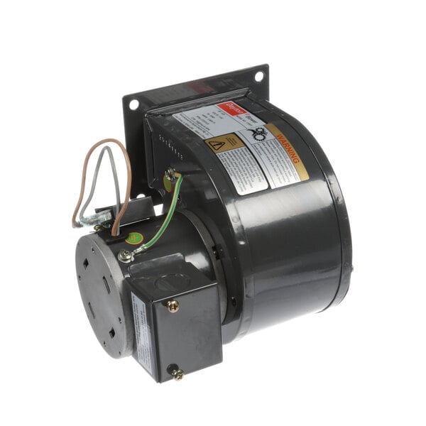 A close-up of a black Baxter motor with wires attached.