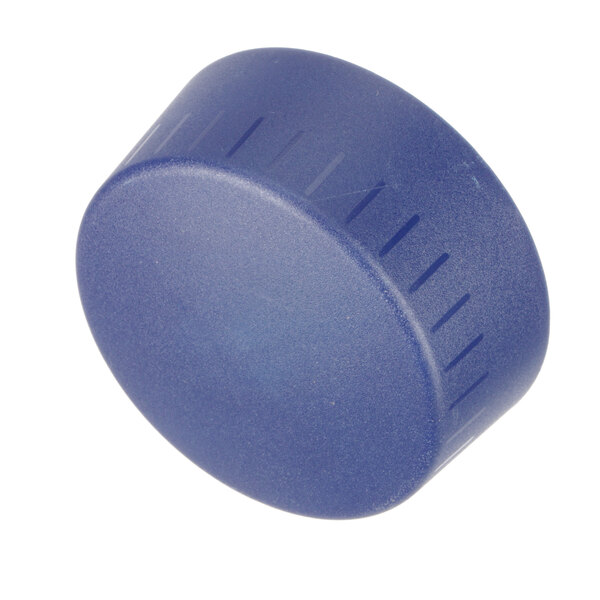 A blue plastic knob with white lines.