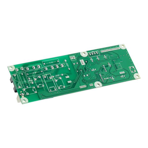 A green printed circuit board for a Turbo Air Refrigeration controller.